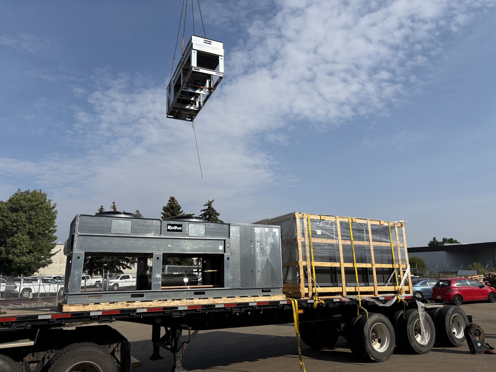 Crane lift rooftop unit delivery
