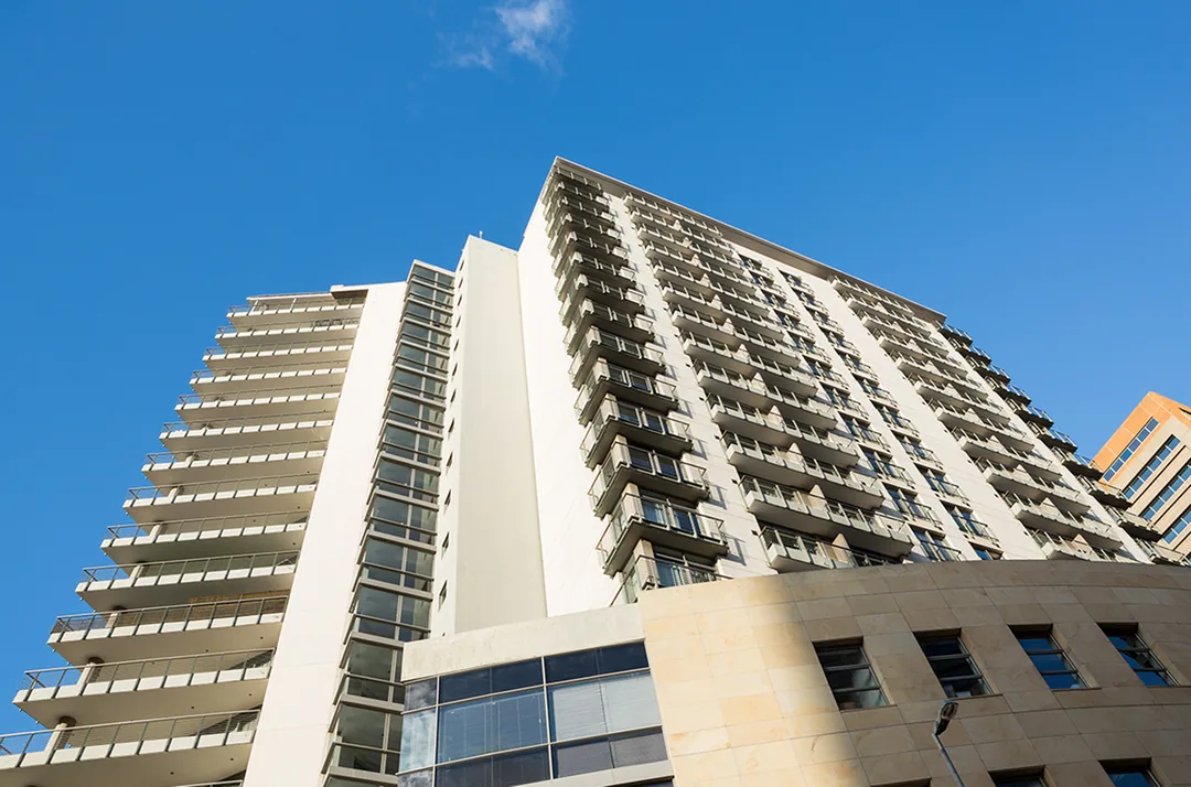 Building maintenance technician on site at a commercial property